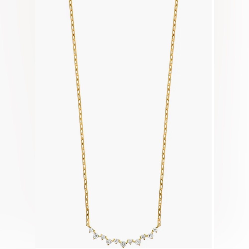 Brand new in box! Never worn. 18k yellow gold diamond necklace.